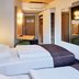 B&B Hotel Frankfurt City-Ost room with twin beds and compact desk in Frankfurt am Main