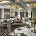 Inn at Bellefield / Hyde Park dining room with round tables, large windows, and garden views
