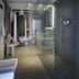 Lords of Verona Luxury Apartments in Verona, modern bathroom with glass shower enclosure and double sinks