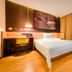 Iu Hotel Tianjin Xianshuigu National Exhibition Center Yuntan University Town guest room with bed and desk