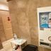 Toyoko Inn Izumo-shi Ekimae laundry room with vending machine and sink in Izumo