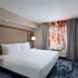 Fairfield by Marriott Inn & Suites Kansas City Airport guest room with king bed and window view