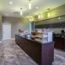 La Quinta Inn & Suites by Wyndham Virginia Beach breakfast area with buffet counters and seating