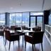 HG La Molina dining lounge with large windows and mountain views in La Molina