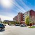 Courtyard by Marriott Cincinnati North at Union Centre exterior in West Chester with parking lot and blue sky