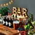 Portsmouth Marriott Hotel bar display with liquor bottles, fruit, snacks, and lit BAR sign in Portsmouth