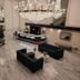 Doolan's Shore Club lobby in Spring Lake Heights with chandeliers, bar seating, and black sofas