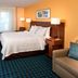 Fairfield Inn & Suites by Marriott Denver North/Westminster guest room with king bed and desk in Westminster