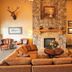 Comfort Suites Golden West on Evergreen Parkway lobby with stone fireplace and seating area in Evergreen