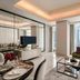 The Residences at The Ritz-Carlton Jakarta, Pacific Place suite with city skyline views and floor-to-ceiling windows