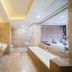 Marriott Hotel Yunfu bathroom with double vanity, glass shower and soaking tub