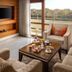 Jaypee Vasant Continental New Delhi living room with TV, seating area, coffee table and window view