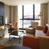 Upon Lisbon Prime Residences apartment with city view, armchairs, sofa and TV in Lisbon