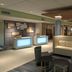 Holiday Inn Express & Suites Charlotte Airport lobby with seating area and front desk in Charlotte