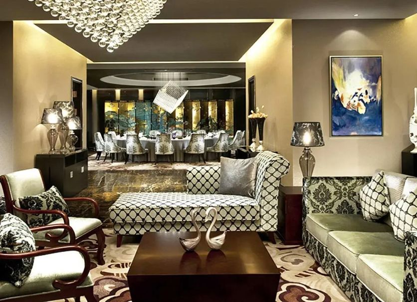 Grand Metro Park Universal Dinosaur Town Hotel lounge with ornate seating and chandelier in Changzhou