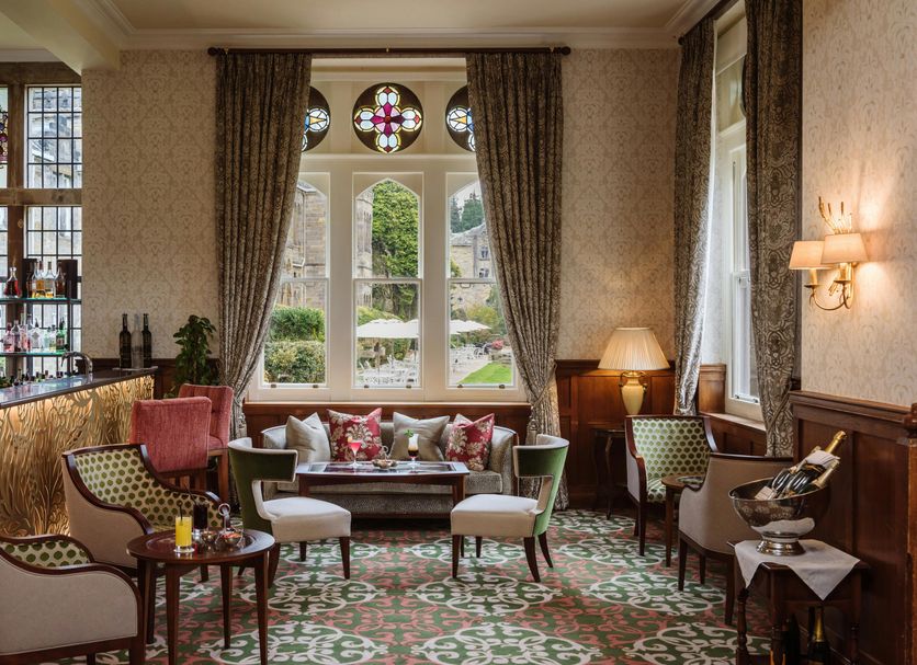 Ashdown Park Hotel & Country Club in East Grinstead lounge with stained-glass window and garden view