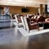 HG Alto Aragón in Formigal lounge with leather sofas, armchairs, fireplace and TV