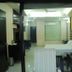 Ganga Beach Resort in Rishikesh guest room with bed and sliding glass doors to a balcony