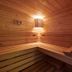Maison de la Garenne & Spa in Vannes sauna with wooden benches and warm lighting