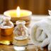 Spa towels, candle, flower, and oil bottles at Real del Mar Golf Resort in Tijuana