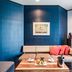 The Beach Terrace Hotel Ao Ishigaki lounge with sofa, coffee table, and blue walls in Ishigaki