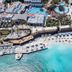 Aerial view of Minos Imperial Luxury Beach Resort & Spa Milatos with pools, loungers, and a sandy beach