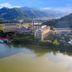 Wonderland Hotel Luxury in Hangzhou beside a lake with mountain views and resort buildings