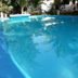 Mansion Giahn Bed & Breakfast in Cancún, outdoor swimming pool surrounded by palm trees