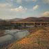 Kalm Pai in Pai with a river view and bridge at sunset