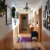 Lakeside Bed & Breakfast in Florence hallway with framed wall art and wood paneling
