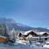 Caravan Park Sexten in Sesto with snow-covered chalets and mountain views