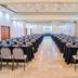 Howard Johnson by Wyndham Barranquilla Versalles meeting room with rows of banquet tables and chairs in Barranquilla
