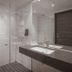 Sommarøy Arctic Hotel Tromsø bathroom with glass shower and double sink vanity in Sommarøy