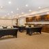Best Western Plus Valdosta Hotel & Suites meeting room with tables and chairs in Valdosta