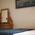 1109 The Decks at 67 Long Street in Cape Town, bedroom with vanity desk, mirror, and chair