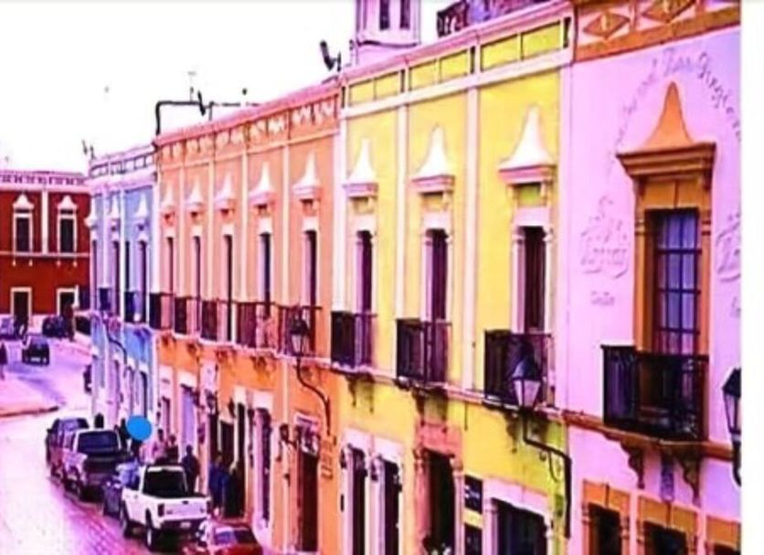 San Diego Tu Casa in Campeche with colorful colonial street view and balconies