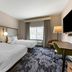 Fairfield by Marriott Inn & Suites Sandusky guest room with two beds and window view
