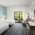 TownePlace Suites by Marriott Pigeon Forge guest room with two beds and a balcony view