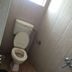 Vrp Guest House Bhuj bathroom with toilet and window