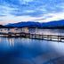 Grand Hôtel De Cala Rossa in Porto-Vecchio, beachfront infinity pool at dusk with bay views