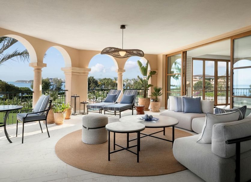 The St. Regis Mardavall Mallorca Resort in Calvià terrace lounge with ocean view and arched columns