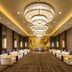 Hilton Changzhou lobby lounge with modern seating and large circular chandeliers in Changzhou