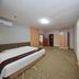 Super 8 by Wyndham Qingdao Jiaonan Heng Li Yuan guest room with twin beds and TV, Qingdao