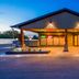 Best Western Black Hills Lodge in Spearfish, exterior entrance at dusk with covered drop-off area