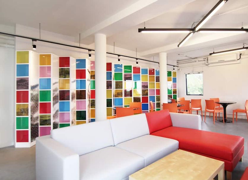 Yha Jockey Club Mt. Davis Youth Hostel Hong Kong lounge with colorful wall art and sofas