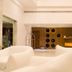 Hotel Le Temps Fort in Tiruchirappalli lobby with white lounge seating and front desk