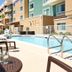 TownePlace Suites by Marriott Fort Walton Beach-Eglin AFB poolside lounge with outdoor pool