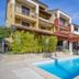 Apartments with Pool Villa Rossella 1 in Rovinj, courtyard pool with loungers and apartment balconies