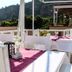 Dalyan Terrace Hotel terrace dining tables with mountain views in Dalyan, Mugla
