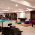 Karma Bavaria Schliersee game room with pool table, fireplace and lounge seating